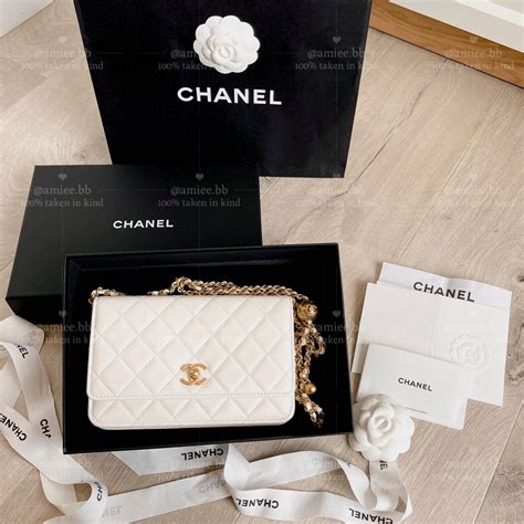 white Chanel wallet on chain